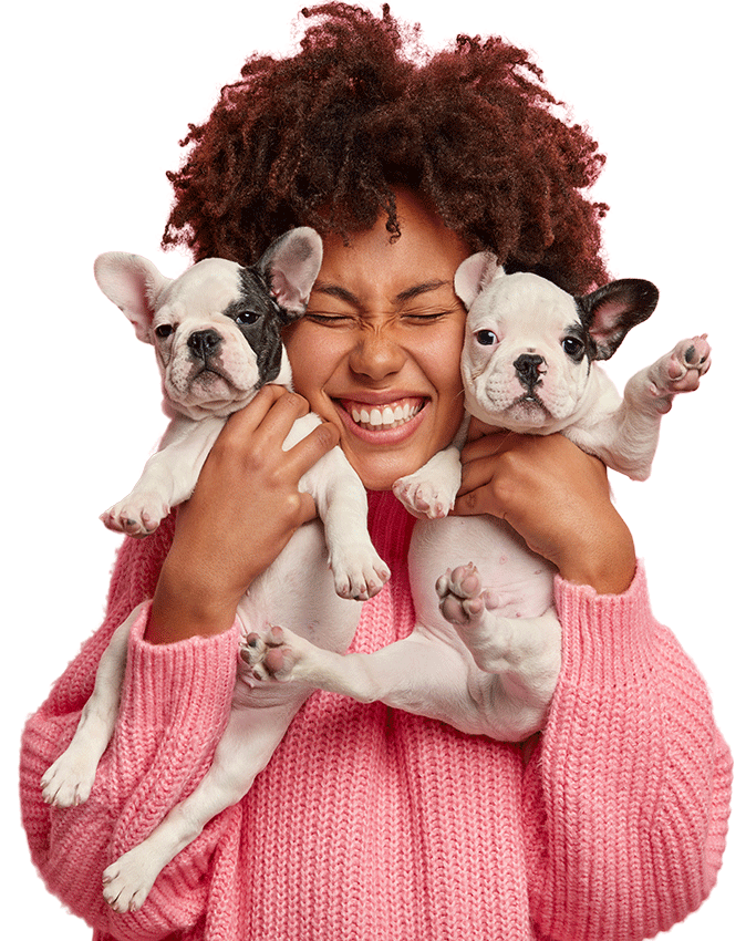 cute image showing a little pupies and a smiling woman